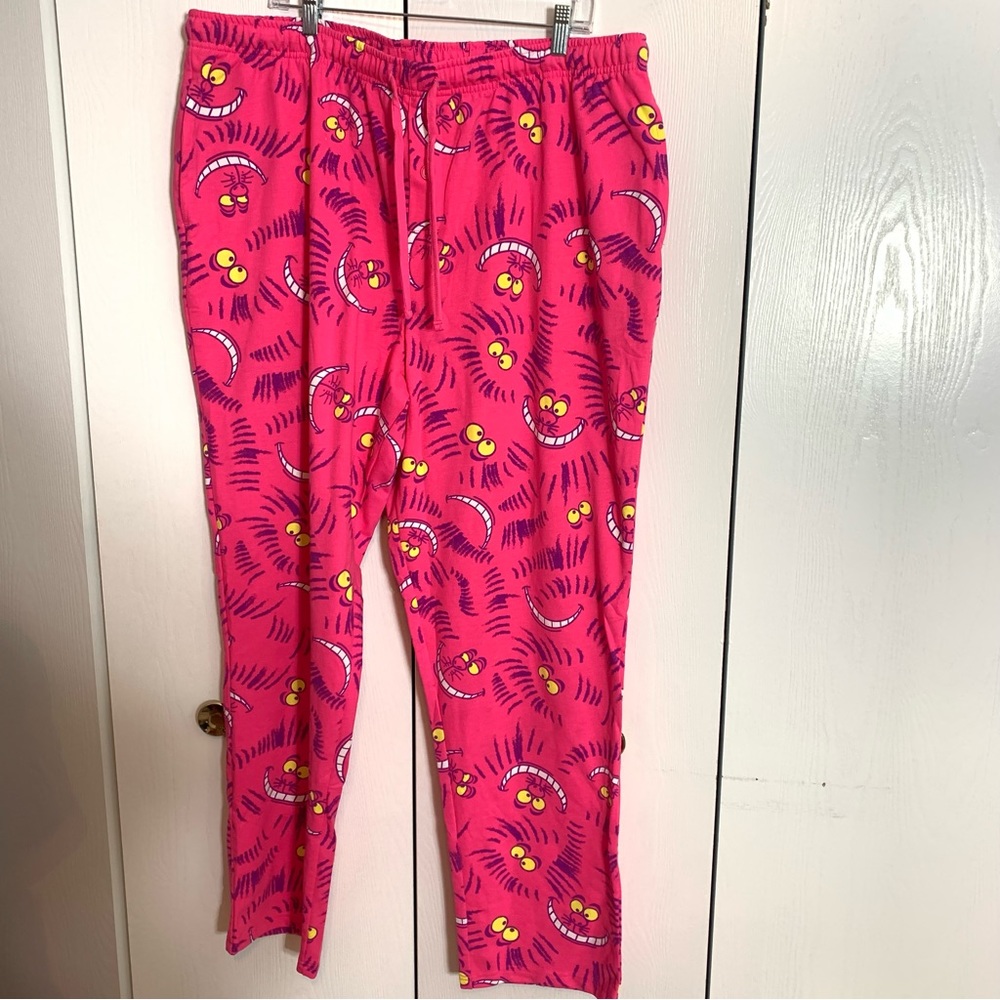 NWT. Disney Cheshire Cat pajama pants XXL. Bright pink pants with Cheshire Cat